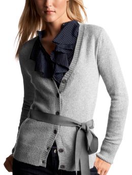 A blouse and cardigan combination This combination is conservative but still different